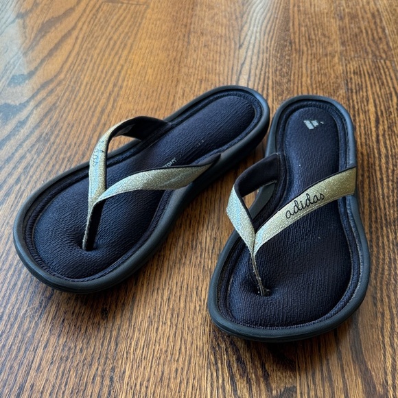 Adidas Women’s 9 Black Flip Flops with Metallic Gold Straps - Picture 1 of 7